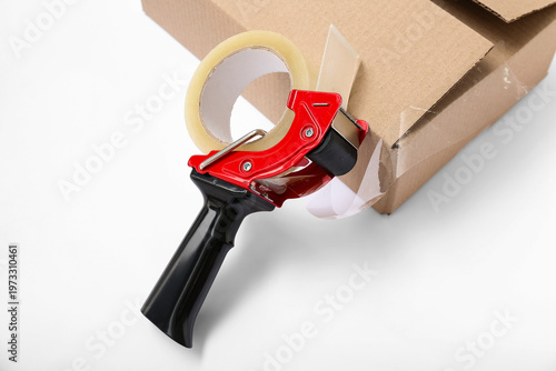 Packing tape dispenser and ...