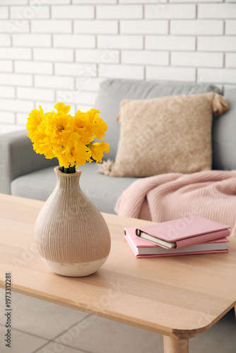 Vase with narcissus flowers...
