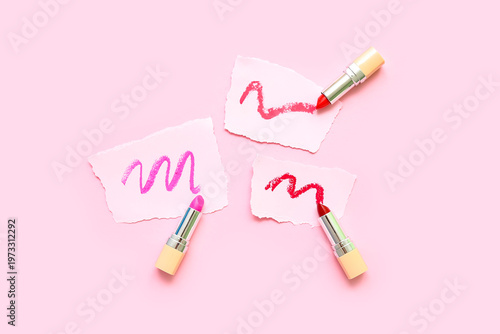Lipsticks and papers with s...
