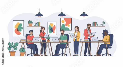 Diverse group of people working in a modern office setting with laptops and artwork