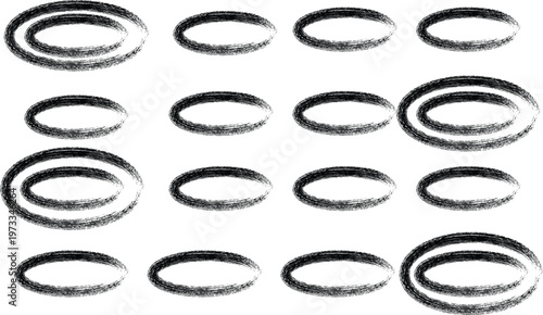 Collection of black rubber o rings arranged in a grid pattern