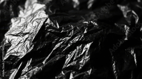Dramatic Abstract Black and White Background of a Crumpled Plastic Surface.