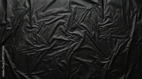 Elegant Black Wrinkled Fabric Texture for an Abstract Background.