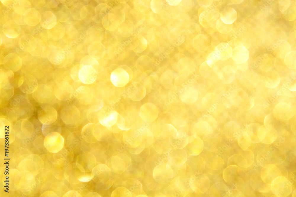 Obraz premium Golden bokeh background with glitter sparkle for festive holiday and luxury design