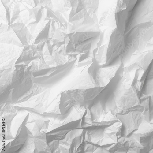 A crumpled white paper texture with many wrinkles and creases