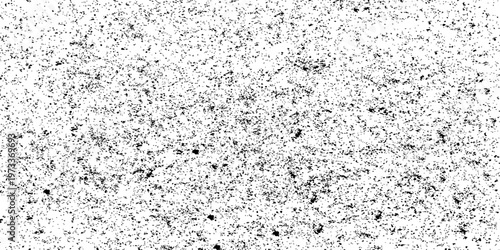 Abstract a captivating texture, resembling a granular pattern of numerous tiny black speckles against a neutral background, creating a mesmerizing display.