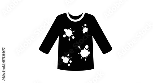 Black paint splattered childrens shirt.