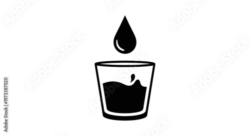 Black liquid in a shot glass.