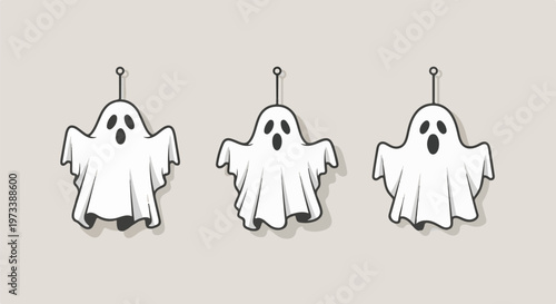 Three hanging cartoon ghosts with wide open mouths and black eyes