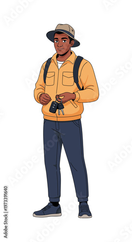 Young black male traveler holding a camera and wearing a hat  
