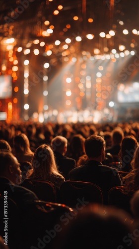Audience watching live concert in a vibrant illuminated venue