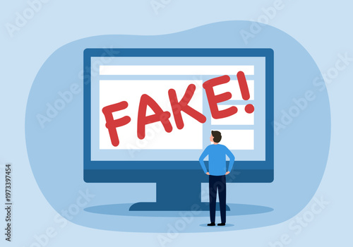 Media literacy and disinformation concept showing a man using a laptop to identify fake news reports on a computer monitor display.