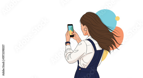 Back view of young woman with long brown hair taking photo with smartphone against abstract colorful shapes background.
