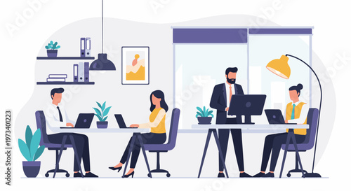 Modern office space with professionals working diligently on laptops and computers