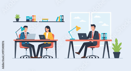 Two colleagues work on laptops at their desks with office plants and shelves