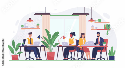 Diverse team members collaborate and work on laptops in a bright, modern office environment