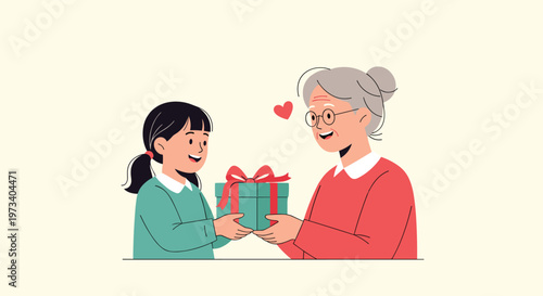 Happy little girl gives a wrapped gift to her grandmother showing love and intergenerational bonding during a celebration.