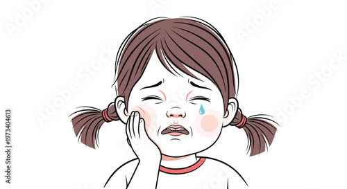 Sad little girl with pigtails crying while holding her cheek due to a painful toothache or dental health problem.