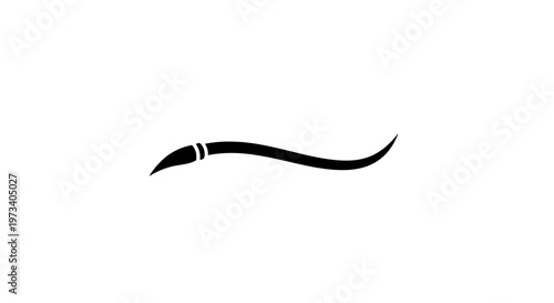 Paintbrush with black bristles and ferrule.