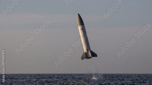 Taken low angle looking rocket taking launch pad center frame sleek cylindrical shape pointed nose clearly vis