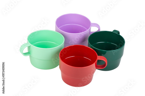Set of four plastic cups with handle for picnic. Tableware made of recycled plastic. Ecological concept. Isolate on white background.