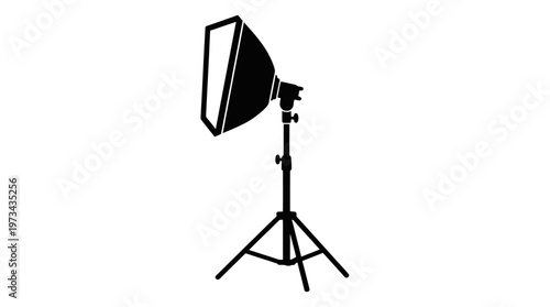 Studio softbox on adjustable tripod stand isolated