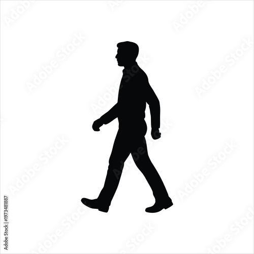 A silhouette of a man walking alone