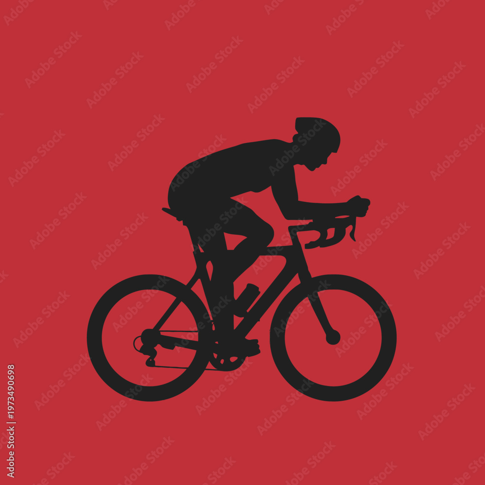 Fototapeta premium A cyclist on a bicycle in silhouette against a red background