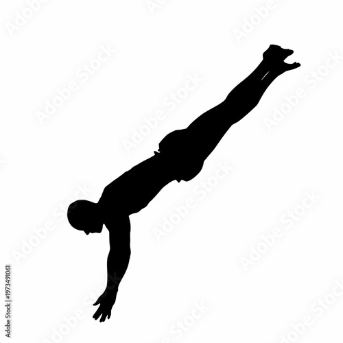 A silhouette of a diver in mid-air, perfectly executing a dive