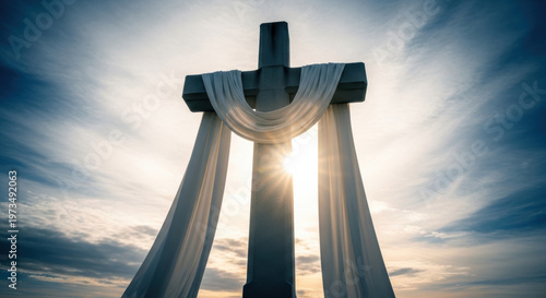 Dramatic Cross with White Fabric at Sunset