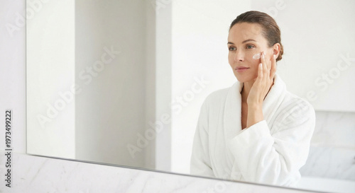 Woman applying skincare, beauty routine, copy space
