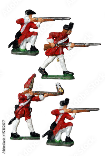 Obraz na plátně Ancient tin toy English soldiers isolated on white background