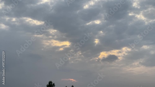 time lapse clouds in blue sky and field.