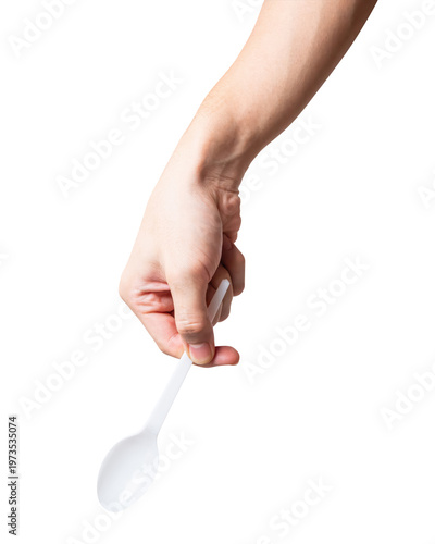 Male hand holding a white plastic spoon isolated on white background with clipping path.