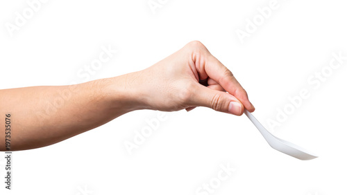 Male hand holding a white plastic spoon isolated on white background with clipping path.
