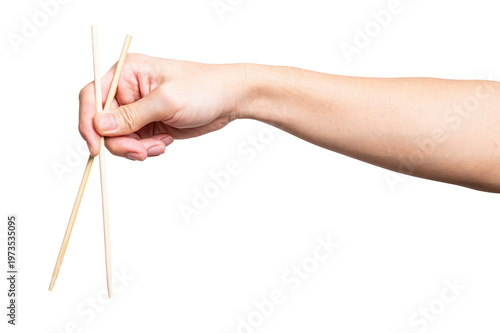 Male hand holding a wood chopstick isolated on white background with clipping path.