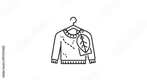 Sweater hanging on a hanger.