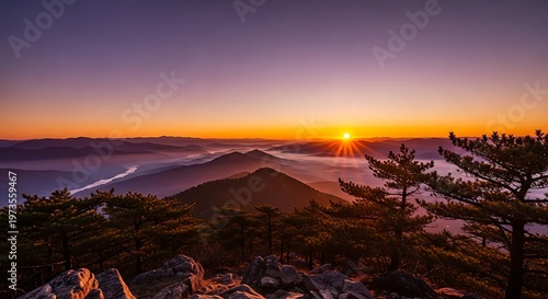 Majestic Sunrise Over Misty Mountains.