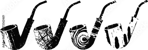 set of four vintage carved wooden tobacco pipes with different bowl patterns and shapes