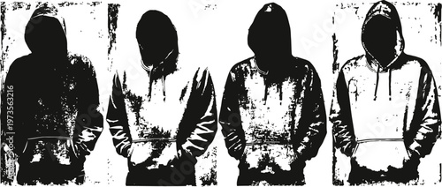 group of four young men wearing hoodies with hands in pockets standing against a wall