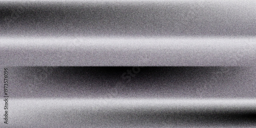 Silver metal foil background. Grey metallic gradient texture. Wide shiny titan or aluminum sheet for label, plate, sign, tag, print. Stainless steel textured material surface.