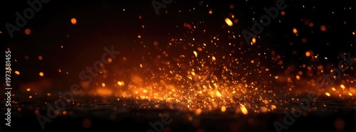 Fiery Sparks Exploding in Darkness with Glowing Embers and Orange Hues.