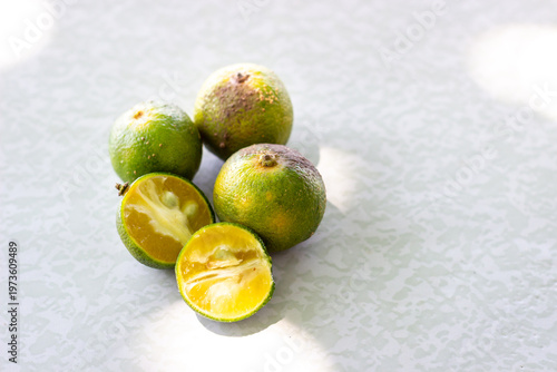 calamansi fruits, known as the Philippine lime, calamansi is an essential ingredient in Filipino cuisine