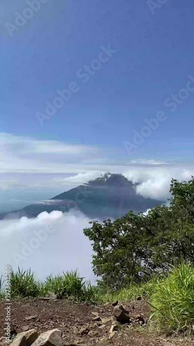 Natural Charm of Mountains with Charming White Clouds