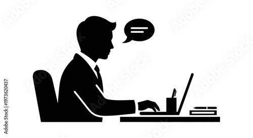 Businessman working on laptop computer.