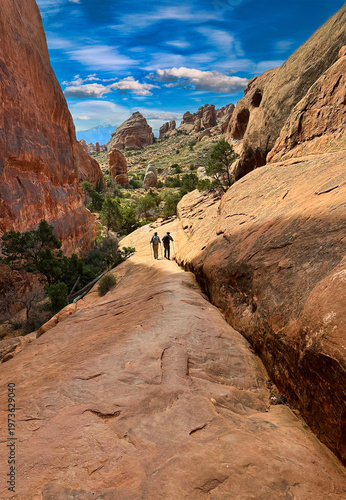 Hikers on the Devil's Garden Trail in Arches National Park, Utah