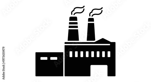 Industrial factory building with smoking chimneys silhouette.