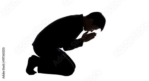 Man Kneeling in Prayer Silhouette Profile.