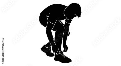 Man tying his shoelace standing still.