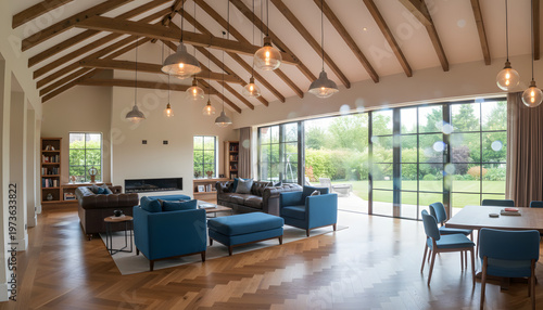 Living room and kitchen interior in new luxury home with large windows